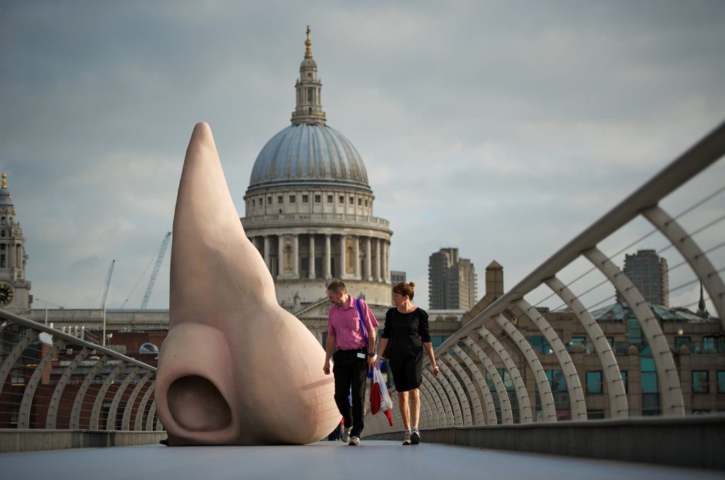 Commuters this morning were surprised to encounter a giant nose as they walked across London's Millennium Bridge.