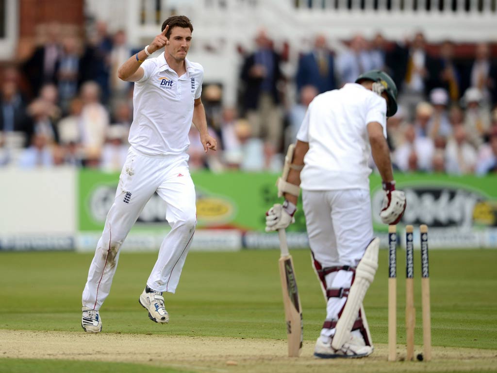 Steven Finn of England celebrates dismissing Hashim Amla