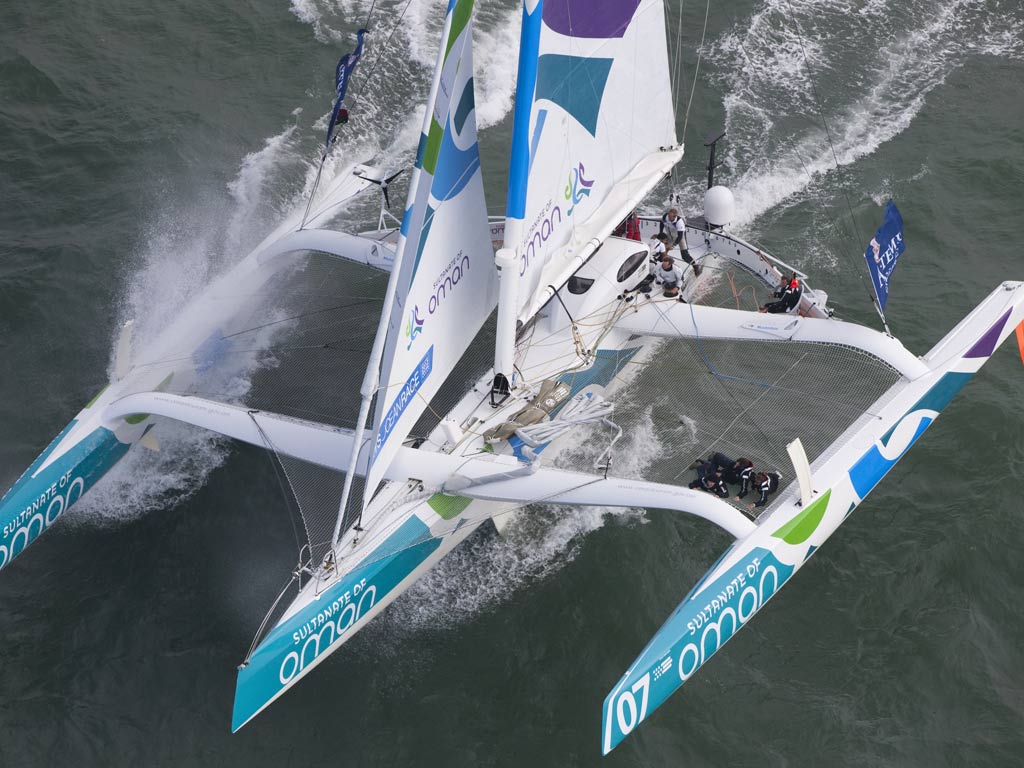Oman Sail’s 70-foot trimaran Musandam put in a powerful display racing round the Isle of Wight and breaking the old record