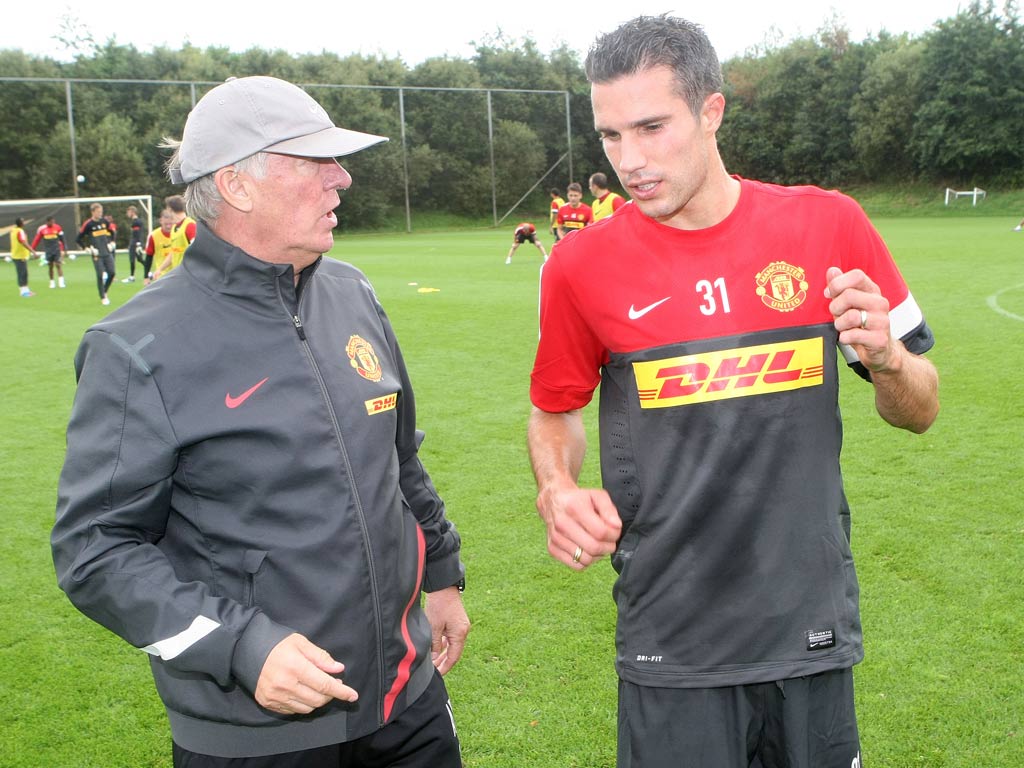 Robin van Persie talks with Alex Ferguson
