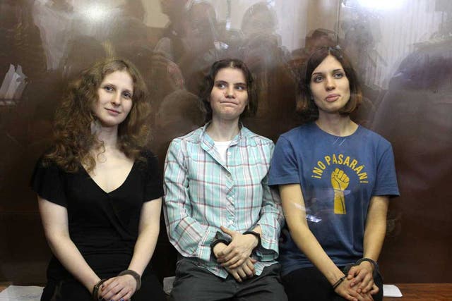 Members of the all-girl punk band 'Pussy Riot': Maria Alyokhina (left), Nadezhda Tolokonnikova (right) and Yekaterina Samutsevich