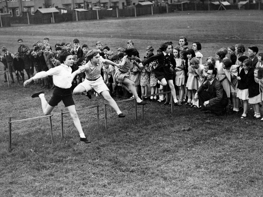 Leap of faith: Many would like to see a return to school sports such as this 1935 race