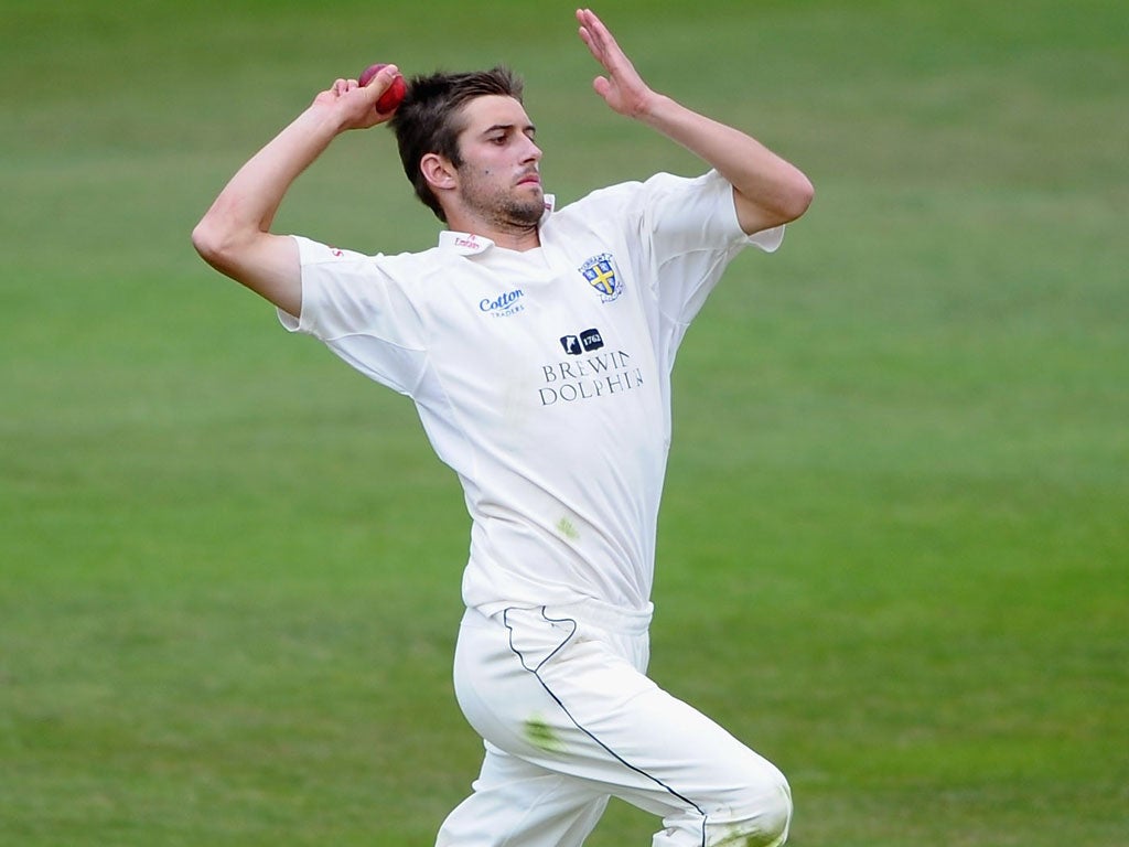 Good form: Durham's medium-fast bowler Mark Wood heads for 5 for 78