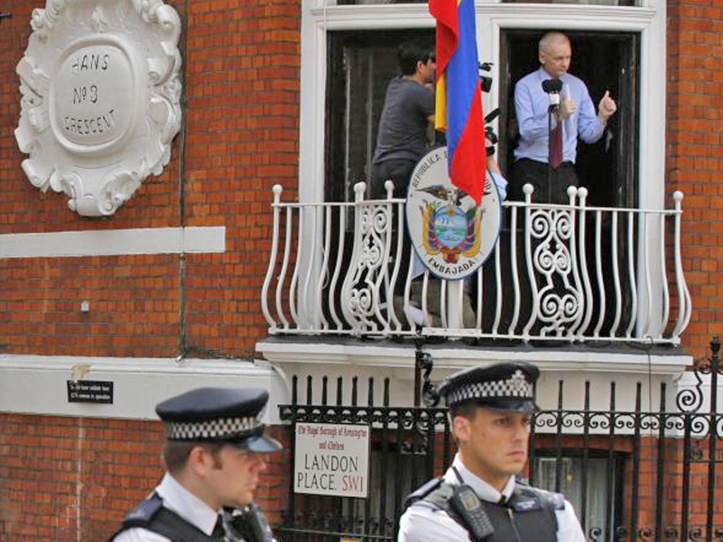 Julian Assange addresses the media and his supporters in August at
the Ecuadorean Embassy in London