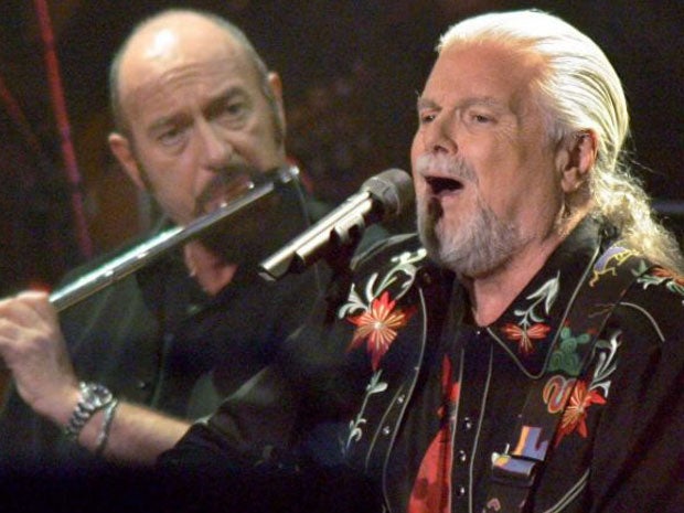 Scottish musician Ian Anderson (left) of Jethro Tull and Scott McKenzie performing during a 2004 concert in Bremen