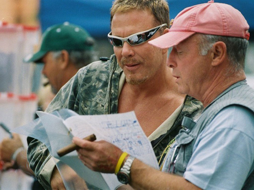 Scott with Mickey Rourke on the set of his 2005 film ‘Domino’, one of the director’s most restless, hyperactive works
