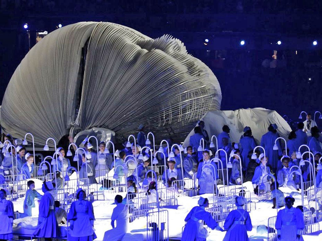 Actors perform in a sequence meant to represent the NHS during the opening ceremony at the London Olympics
