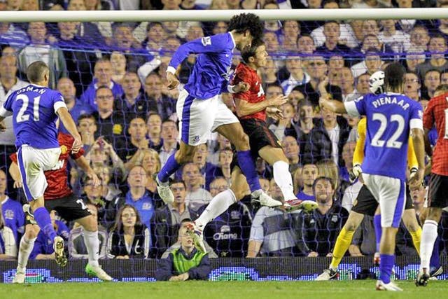 Marouane Fellaini rises high to head in Everton’s winner last night at Goodison