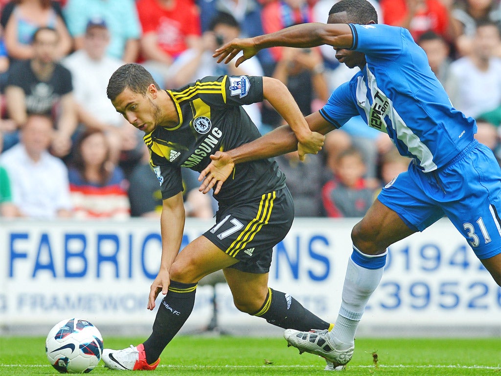 Eden Hazard (left) coped with some physical challenges on his first start for Chelsea against Wigan