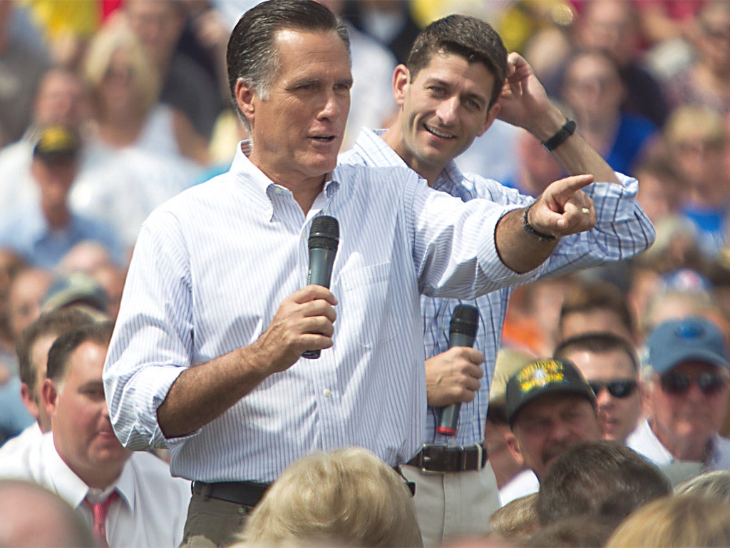 Mitt Romney and the Republican vice-presidential candidate Paul Ryan in Manchester, New Hampshire