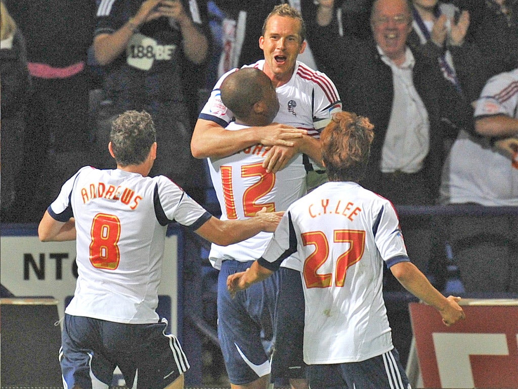 Kevin Davies celebrates the 77th minute goal which set up Bolton’s win last night