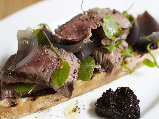 Steak, onion and watercress sandwich