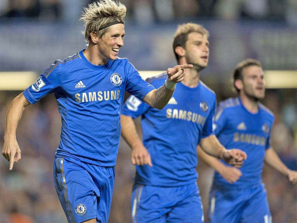 Fernando Torres celebrates scoring Chelsea's third goal