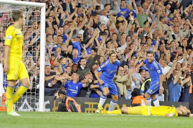 Fernando Torres celebrates scoring Chelsea's third goal with team-mate Juan Mata