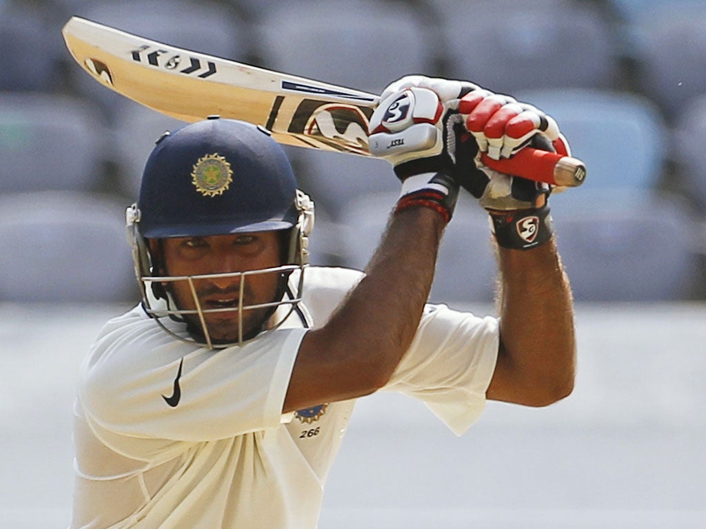 Cheteshwar Pujara hit a maiden Test ton against New Zealand