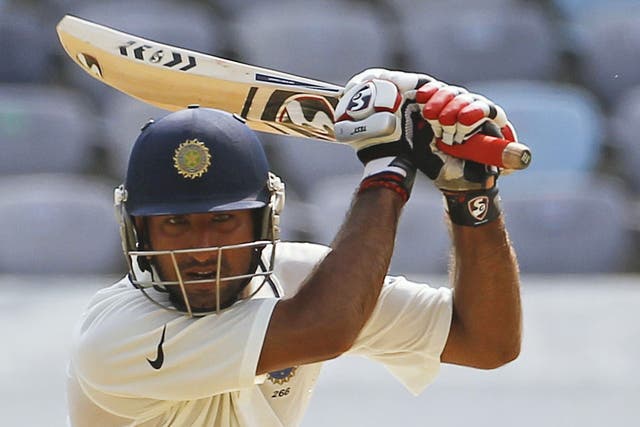 Cheteshwar Pujara hit a maiden Test ton against New Zealand