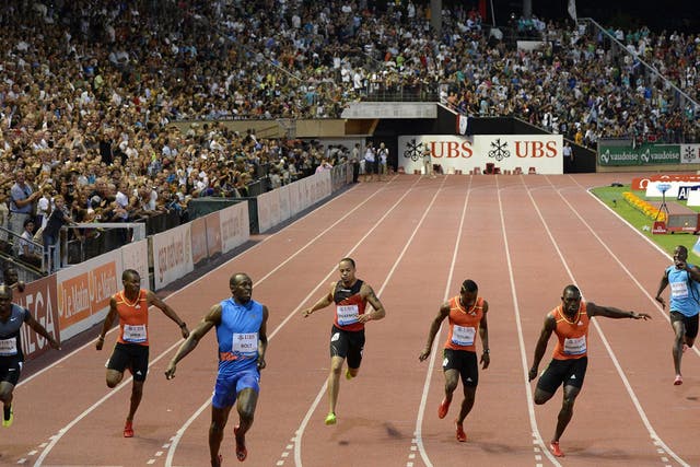 Usain Bolt, third from the left, wins the 200m in Lausanne last night