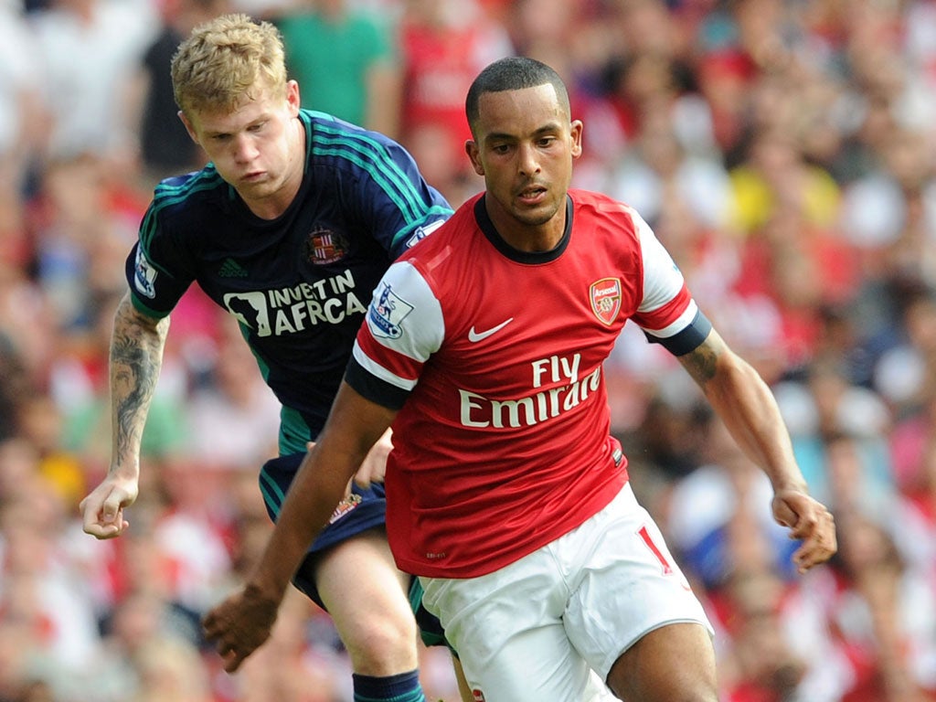 Theo Walcott is in talks about extending his contract at Arsenal before it enters its final season