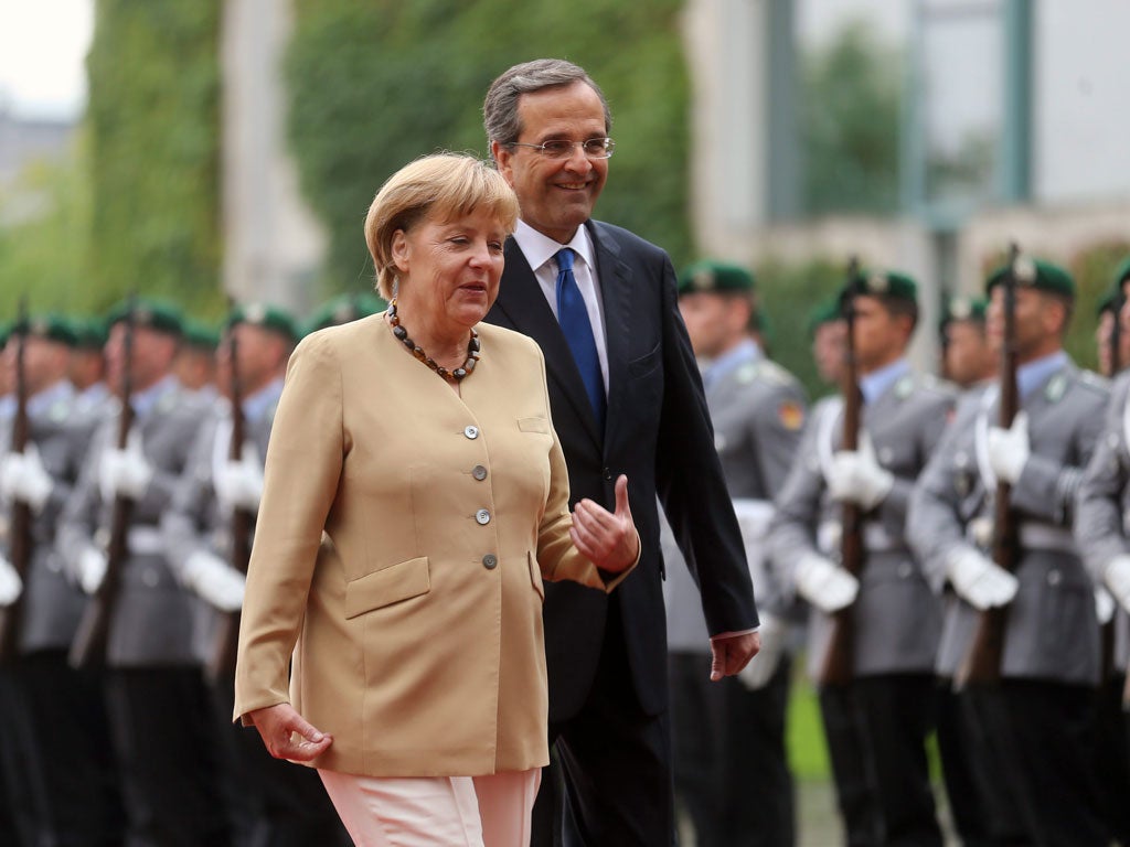 After talks with Antonis Samaras, Angela Merkel stressed that she wanted Greece in the eurozone