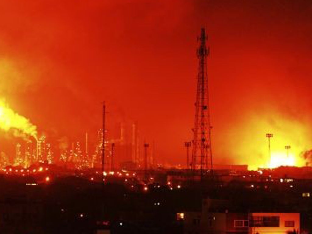 Balls of fire rose over the Amuay refinery, one of the largest in the world, in video posted on the Internet by people who were nearby at the time