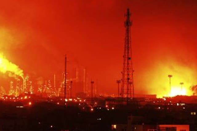 Balls of fire rose over the Amuay refinery, one of the largest in the world, in video posted on the Internet by people who were nearby at the time