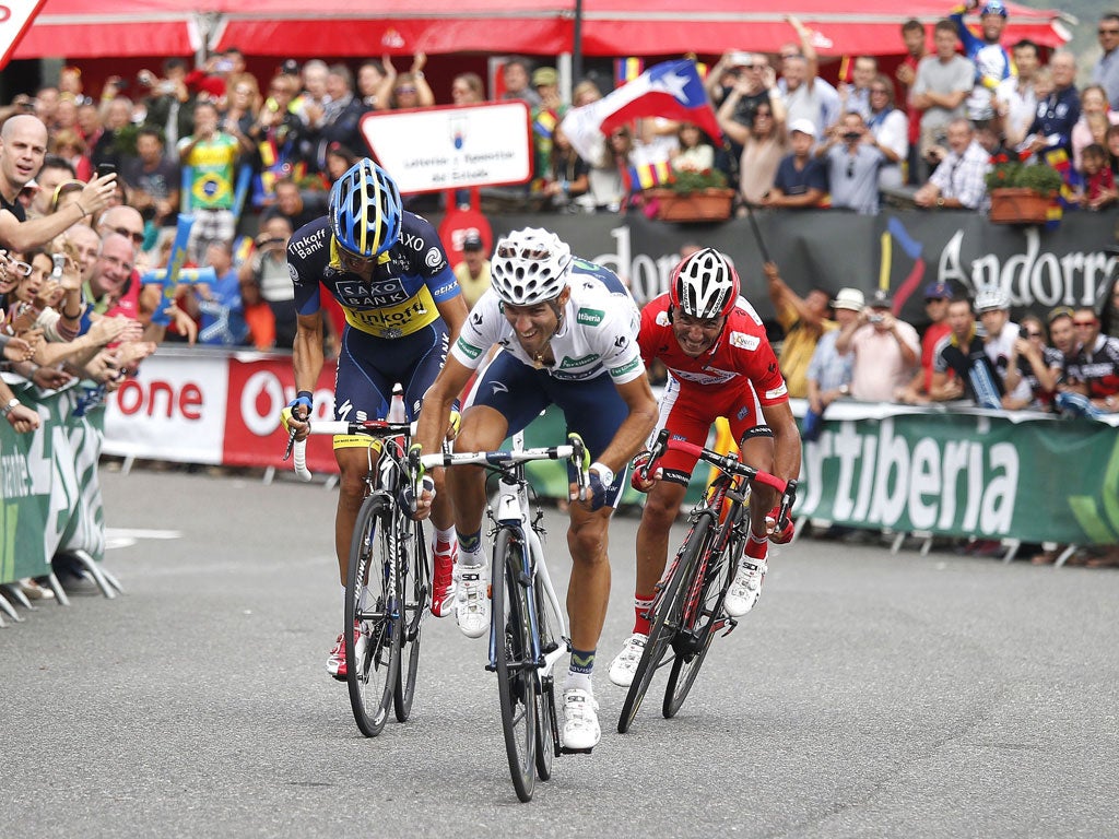 Reign in Spain: Alejandro Valverde wins yesterday's Tour of Spain stage from Joaquim Rodriguez (right) and Alberto Contador