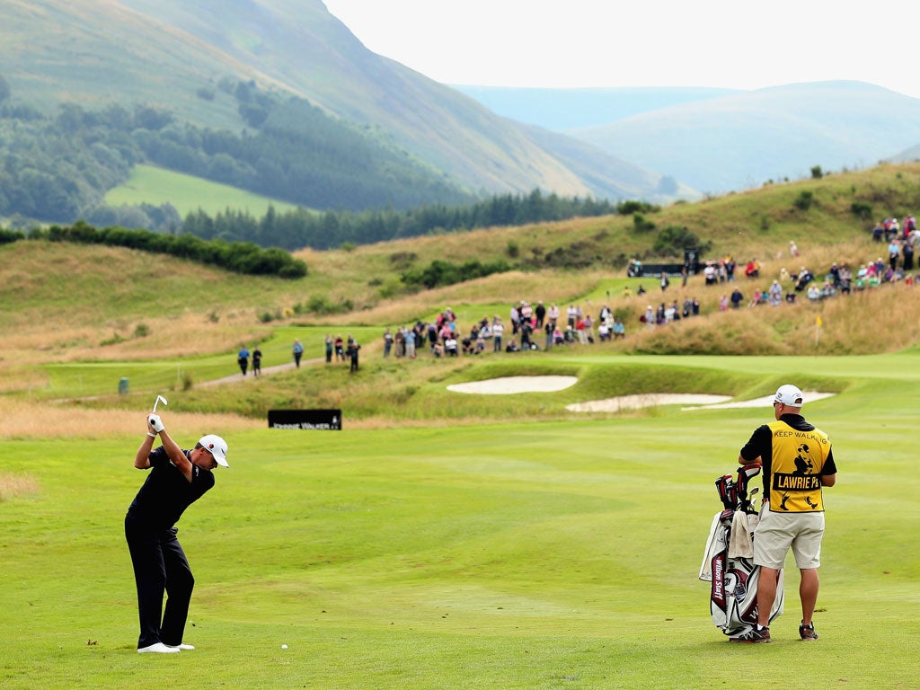 Superb outlook: Paul Lawrie, in fine form before the Ryder Cup, plays the second at Gleneagles on his way to a 67