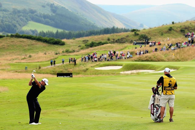 Superb outlook: Paul Lawrie, in fine form before the Ryder Cup, plays the second at Gleneagles on his way to a 67