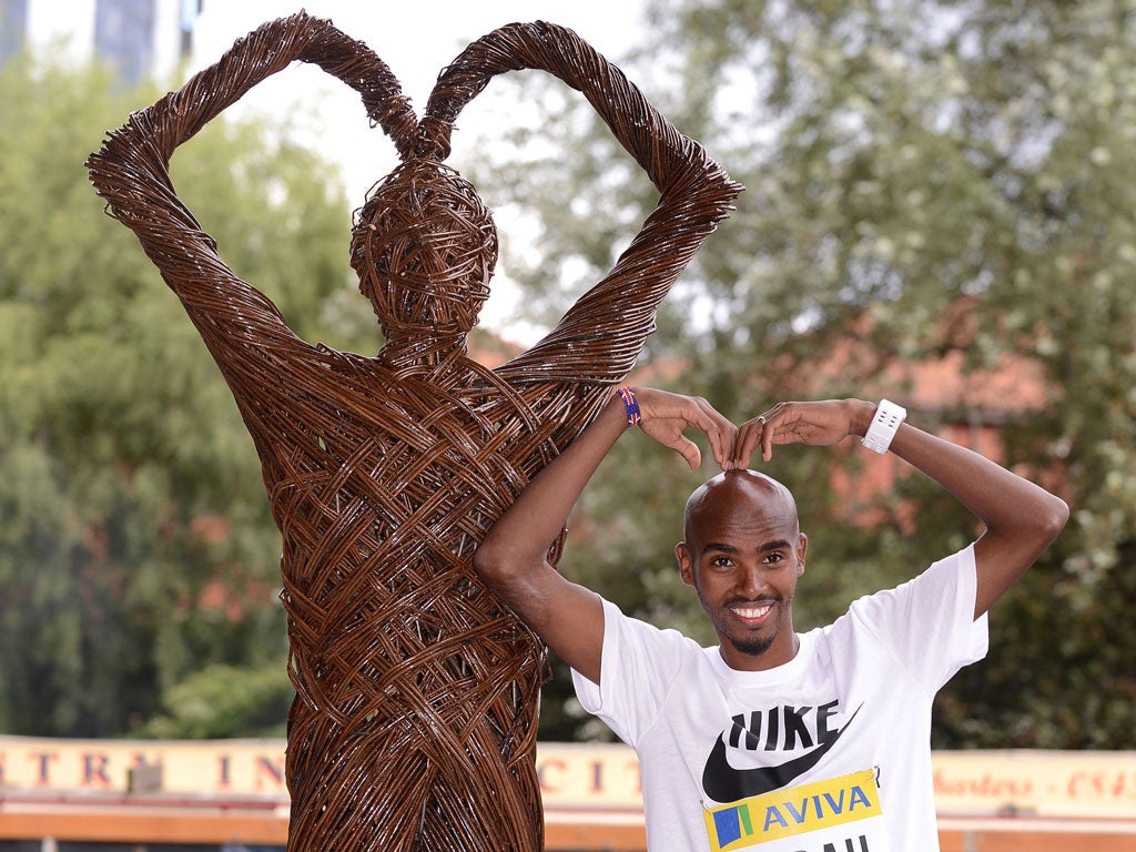 Mo and me: Mo Farah and statue do the Mobot