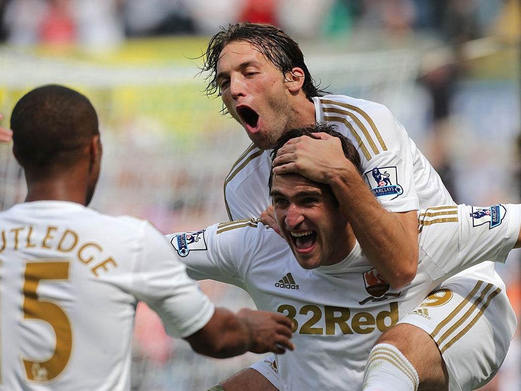 Danny's the boy: Swansea are in dreamland as Danny Graham puts them 3-0 up with his 64th-minute strike from close range at the Liberty Stadium