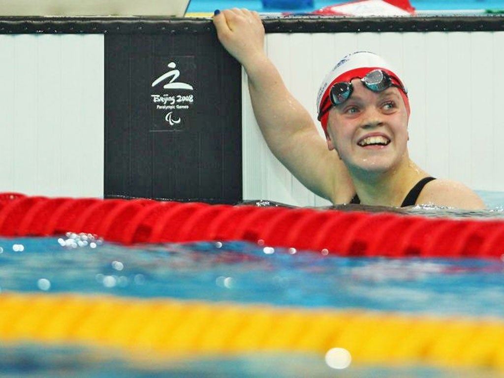 Ellie Simmonds celebrates after winning the gold medal in the 100m
freestyle S6 final at the Beijing Olympics