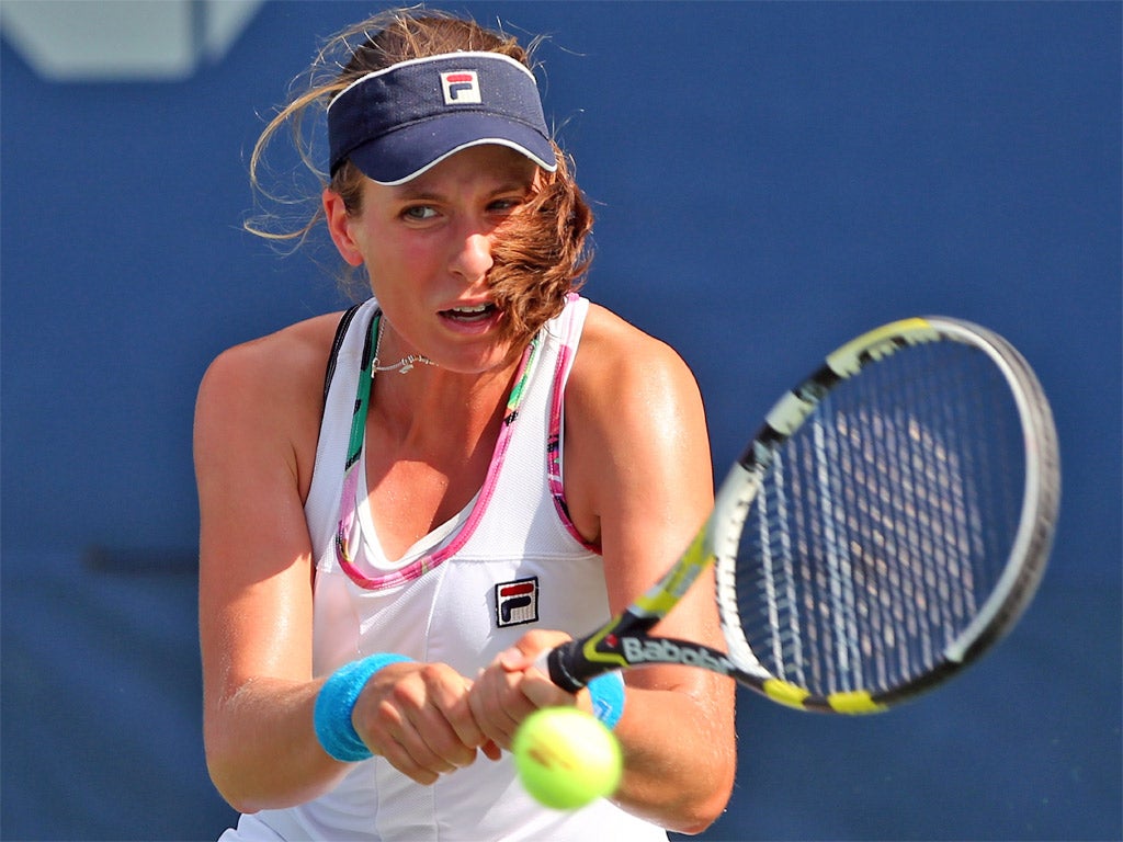 Britain's Johanna Konta hits a return during her win yesterday