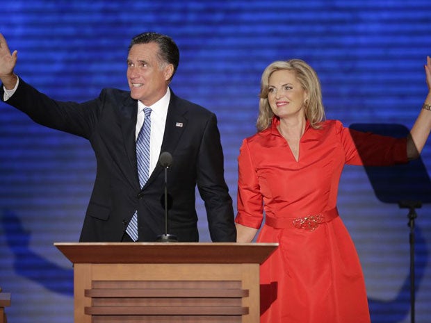 Ann Romney waves with her husband Republican presidential nominee Mitt Romney during the Republican National Convention