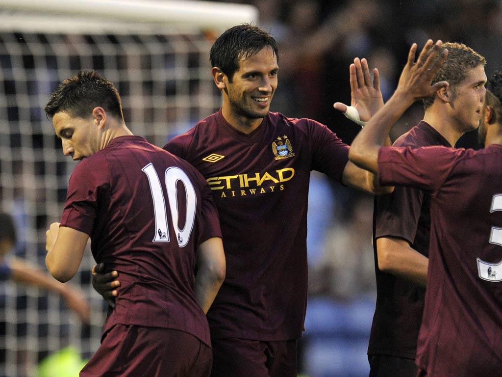 Rocky makes his debut, Roque Santa Cruz, Manchester City