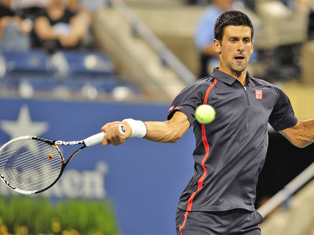 Novak Djokovic hits a return during his win over Paolo Lorenzi