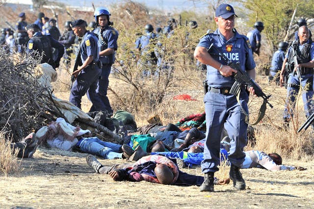 Police at the scene of the Lonmin mine massacre earlier this month