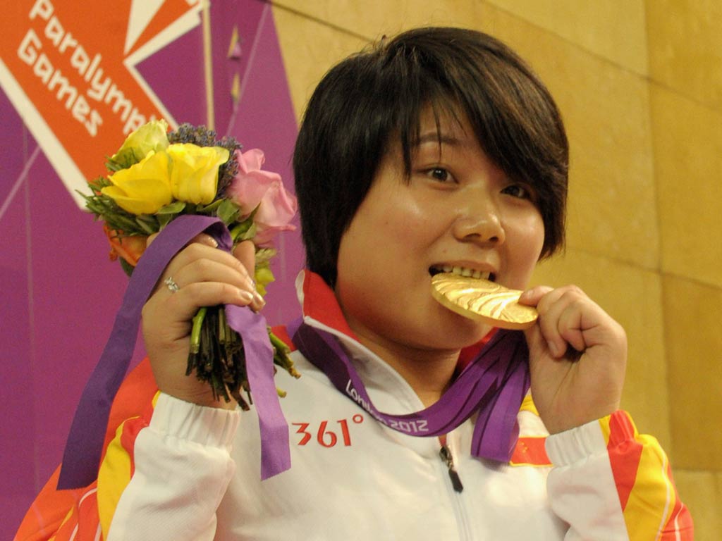 Zhang Cuiping of China wins the first gold medal of the Paralympic Games