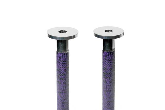 1. Snakeskin print candlesticks

<p>£210 for pair, Eliska. These sexy purple candlesticks are just the thing for some decadent dining. 020 7723 5521, eliskadesign.com</p>