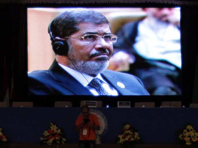 President Morsi: prompted a Syrian walk-out at the summit