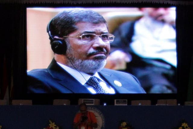 President Morsi: prompted a Syrian walk-out at the summit