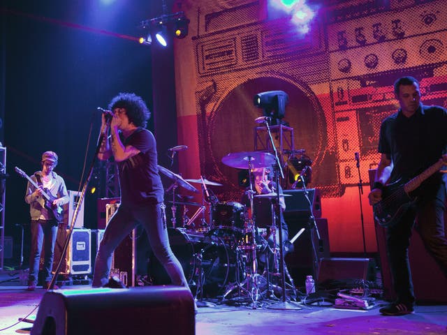 All friends again: Cedric Bixler-Zavala and co meet up for a long-anticipated reunion at the Academy in Brixton