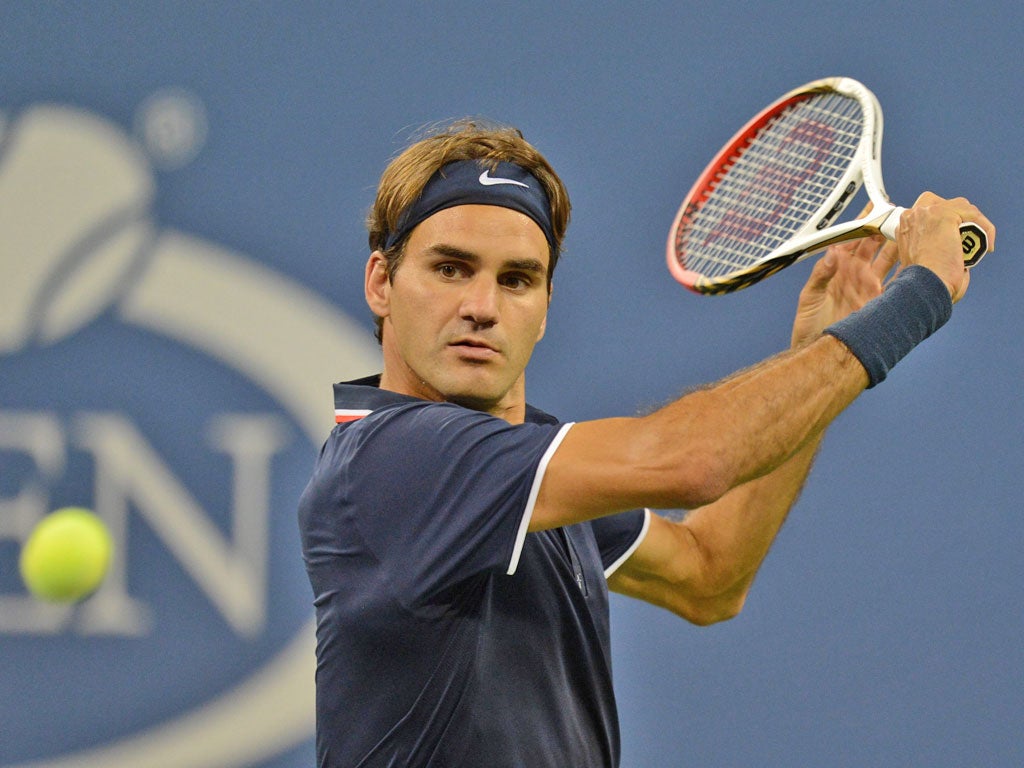 Roger Federer on the attack