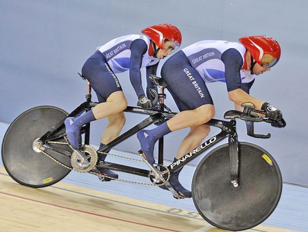 At the double: Neil Fachie and Barney Storey ride to tandem victory