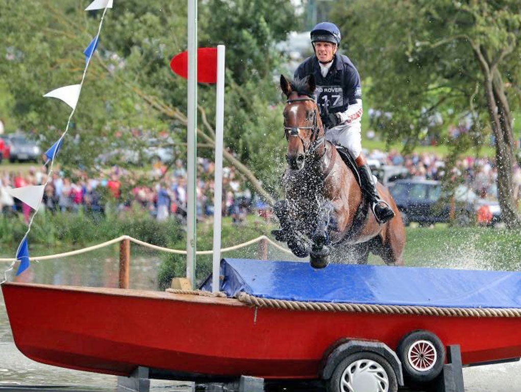 William Fox-Pitt tackles one of the Burghley fences yesterday