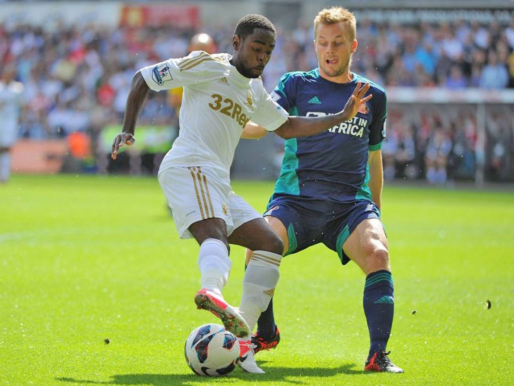 Dire problem: Swansea’s Nathan Dyer struggles to pass Sebastian Larsson