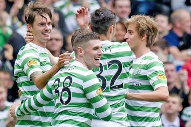 Opening goal: Mikael Lustig scores for the champions in the 11th minute