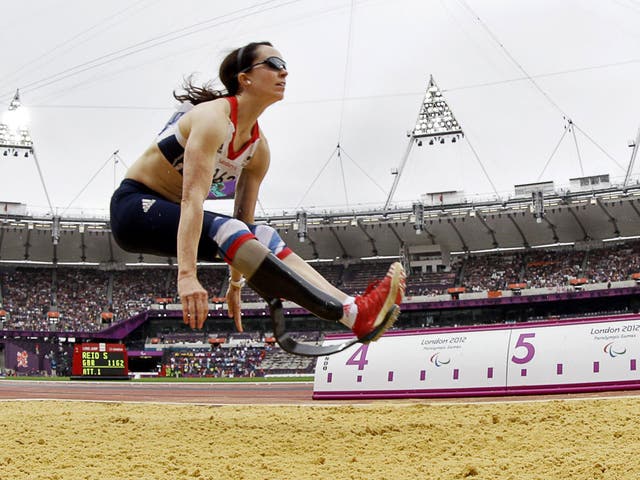 <p>Stef Reid on her way to a silver medal in the long jump yesterday</p>