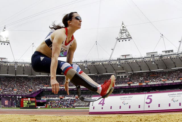 <p>Stef Reid on her way to a silver medal in the long jump yesterday</p>
