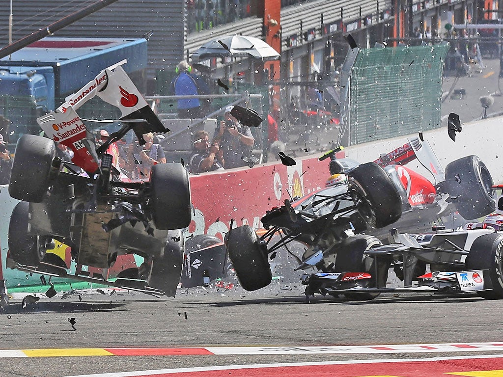 Lewis Hamilton's race ends in a collision with Fernando Alonso