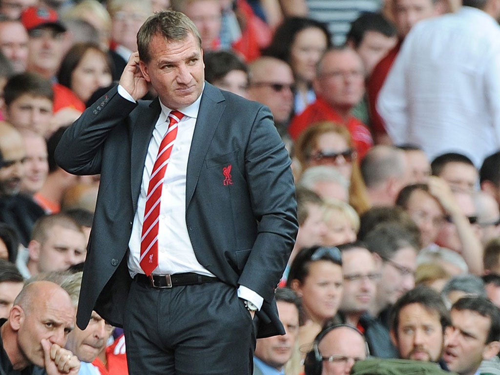 Liverpool manager Brendan Rodgers contemplates defeat